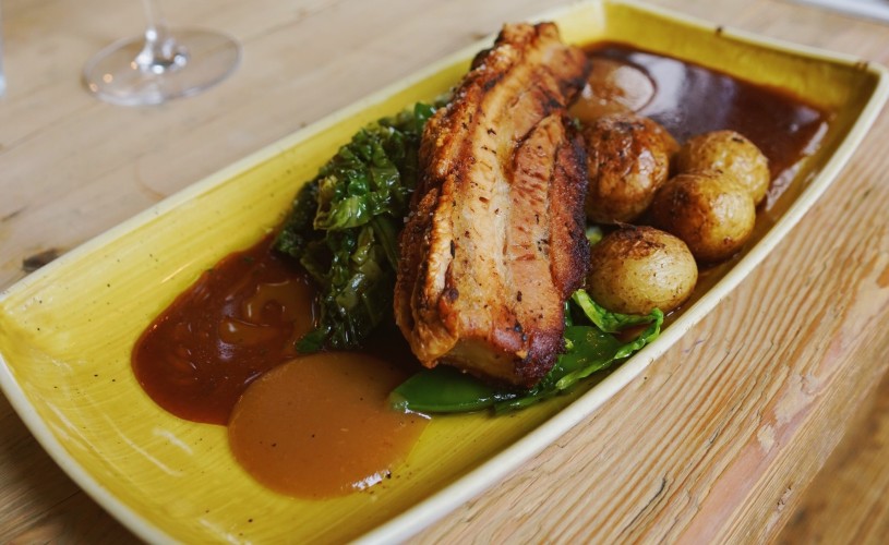 Slow roast pork belly with apple and cider sauce from The Clifton Sausage